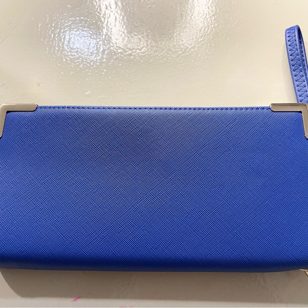 Gold trim wristlet wallets